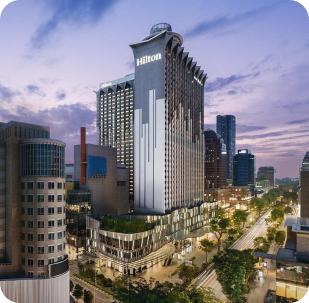 City skyline with international hotel towers at dusk